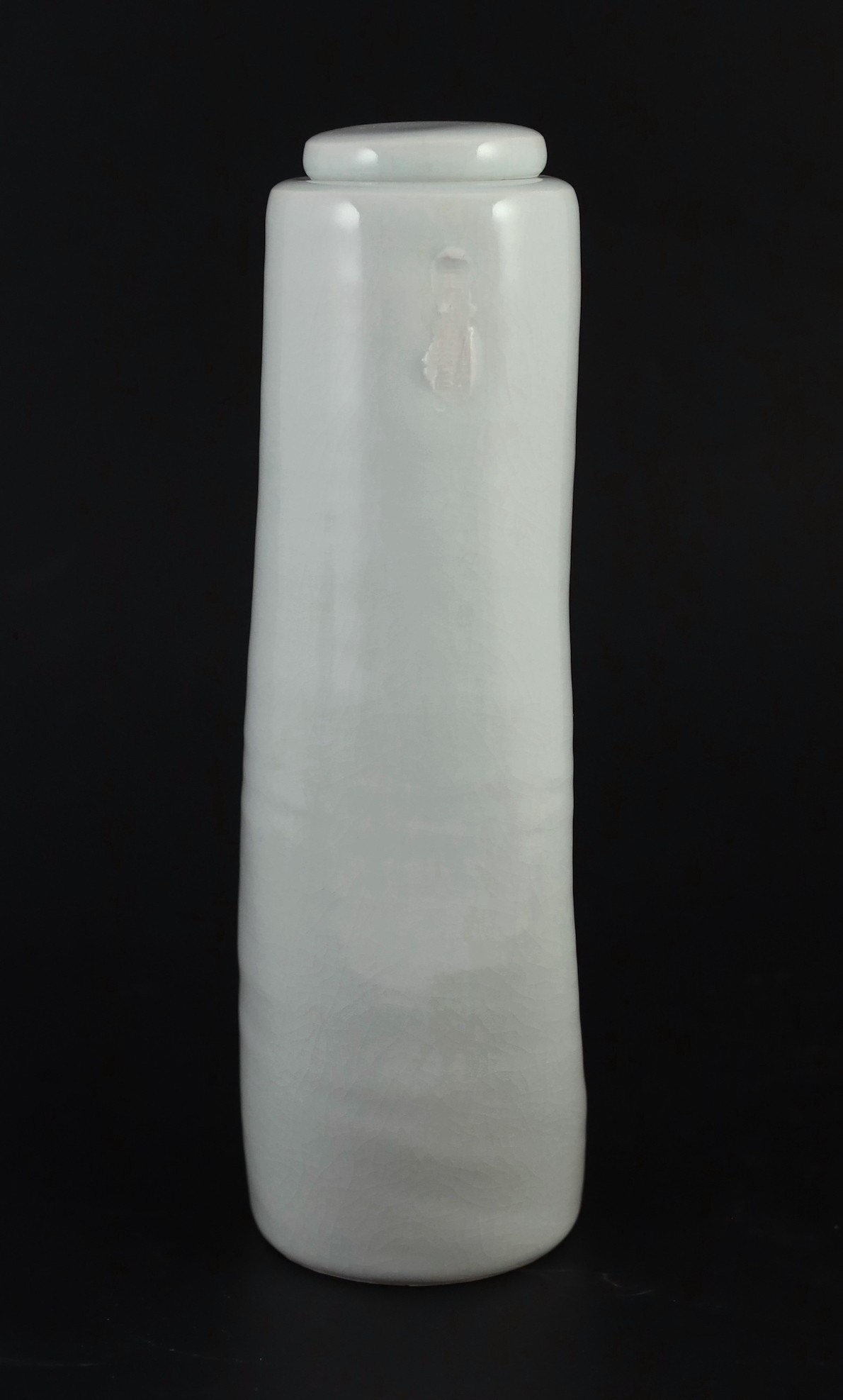 Edmund de Waal (b.1964) a tall dimpled porcelain lidded vase, c.1993, 28.5 cm high